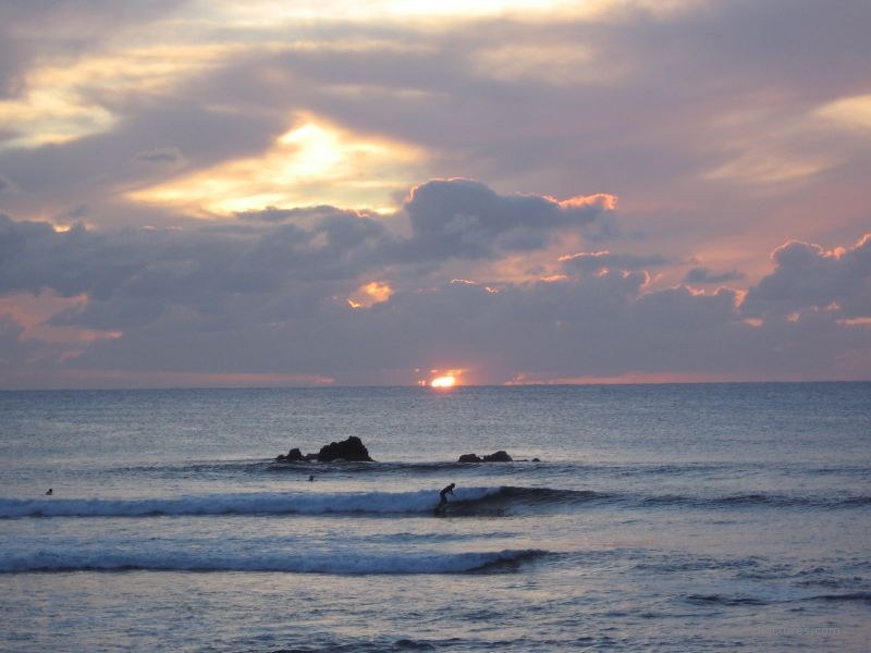 surfer surf sunset